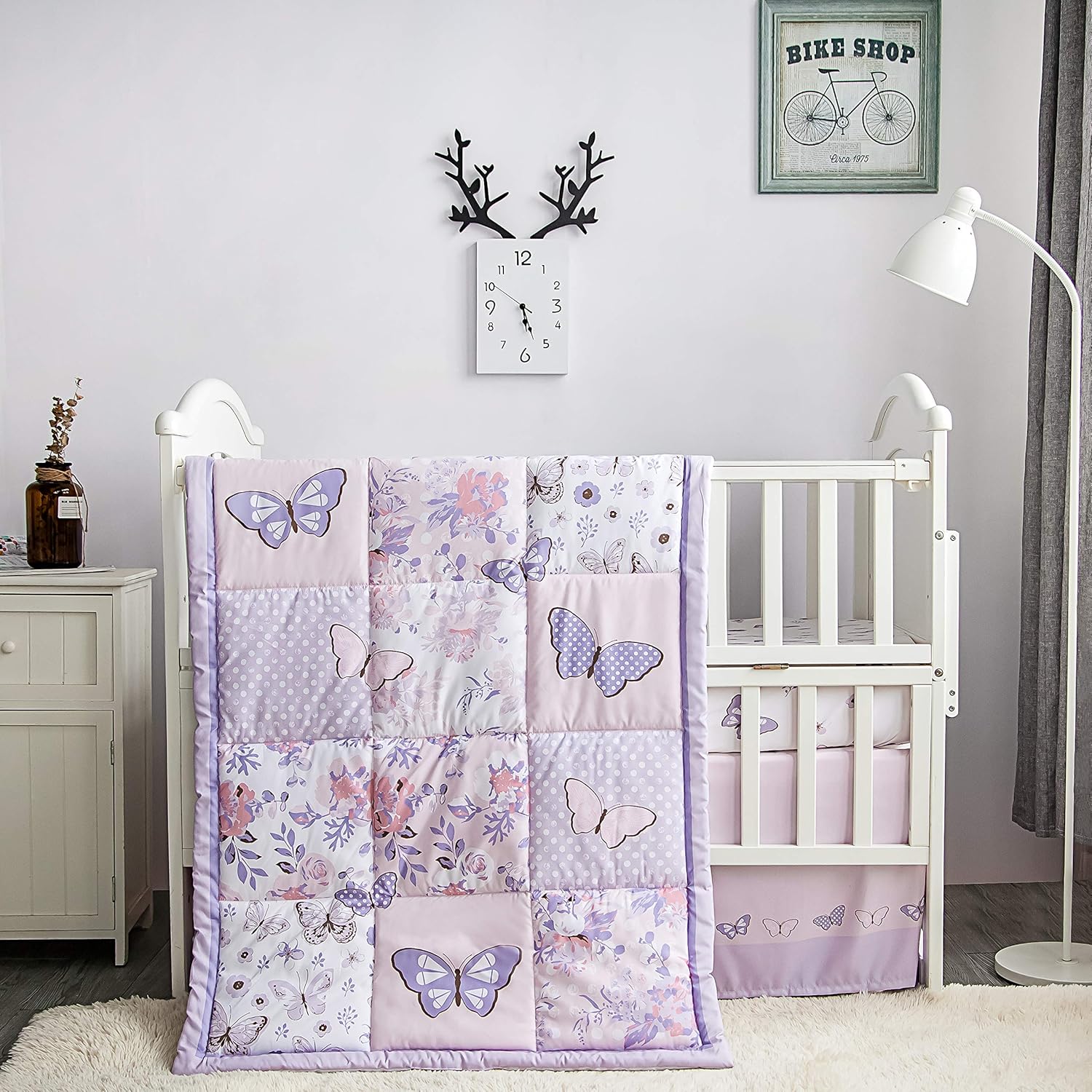 La Premura purple butterfly baby crib bedding set front view showcasing the complete three piece nursery collection.
