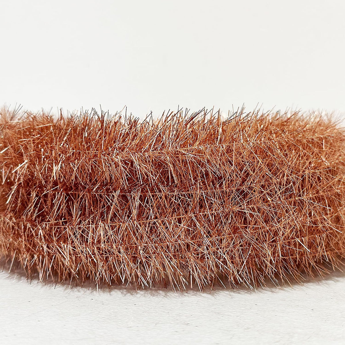 Two 36-foot coils of anti-static copper tinsel laid out