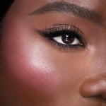 Side angle of the Charlotte Tilbury Hollywood Blush and Glow compact showing its sleek travel friendly design.