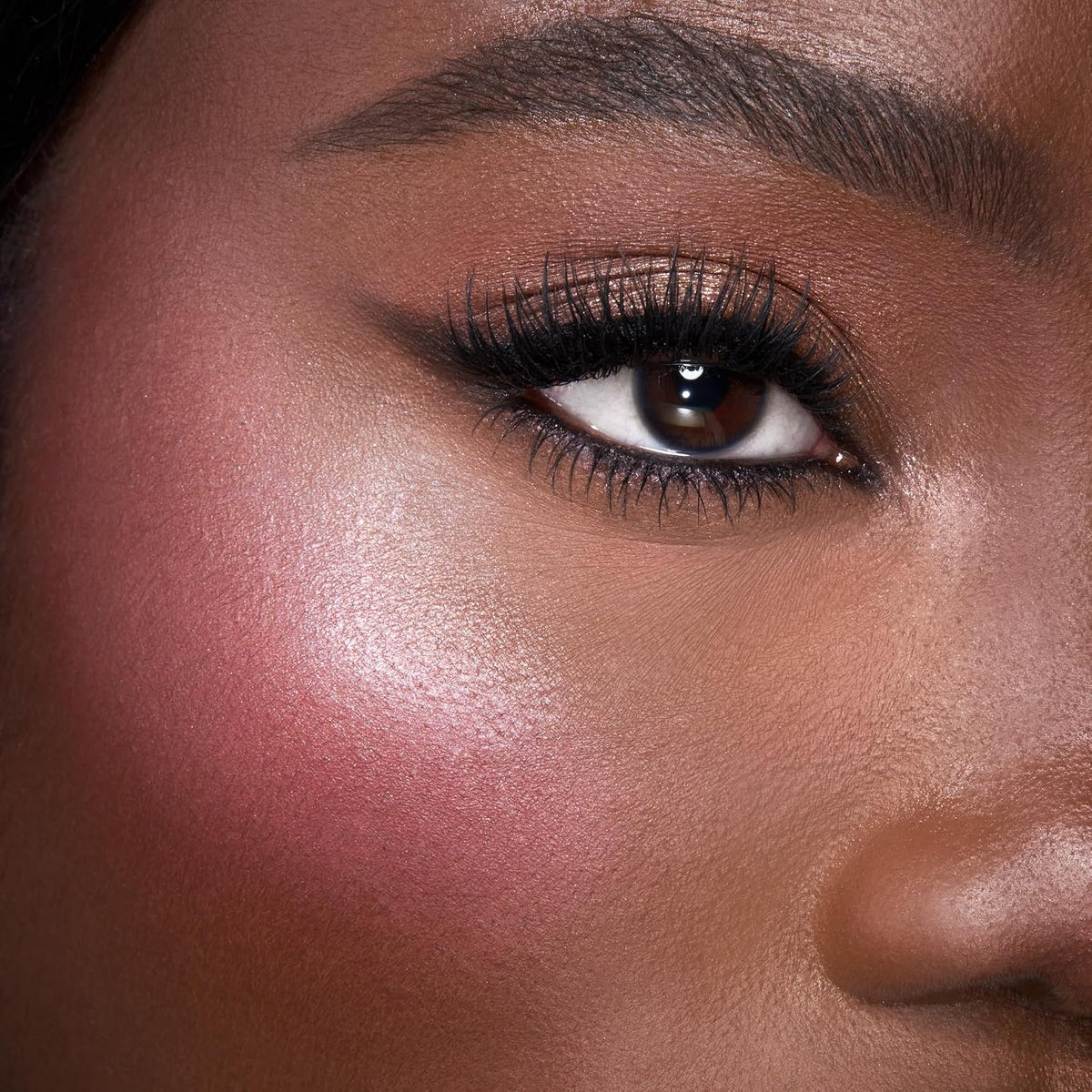 Side angle of the Charlotte Tilbury Hollywood Blush and Glow compact showing its sleek travel friendly design.