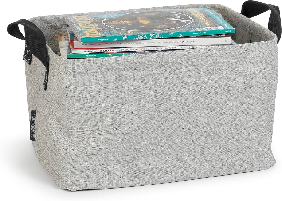 Brabantia collapsible laundry basket holding wet garments