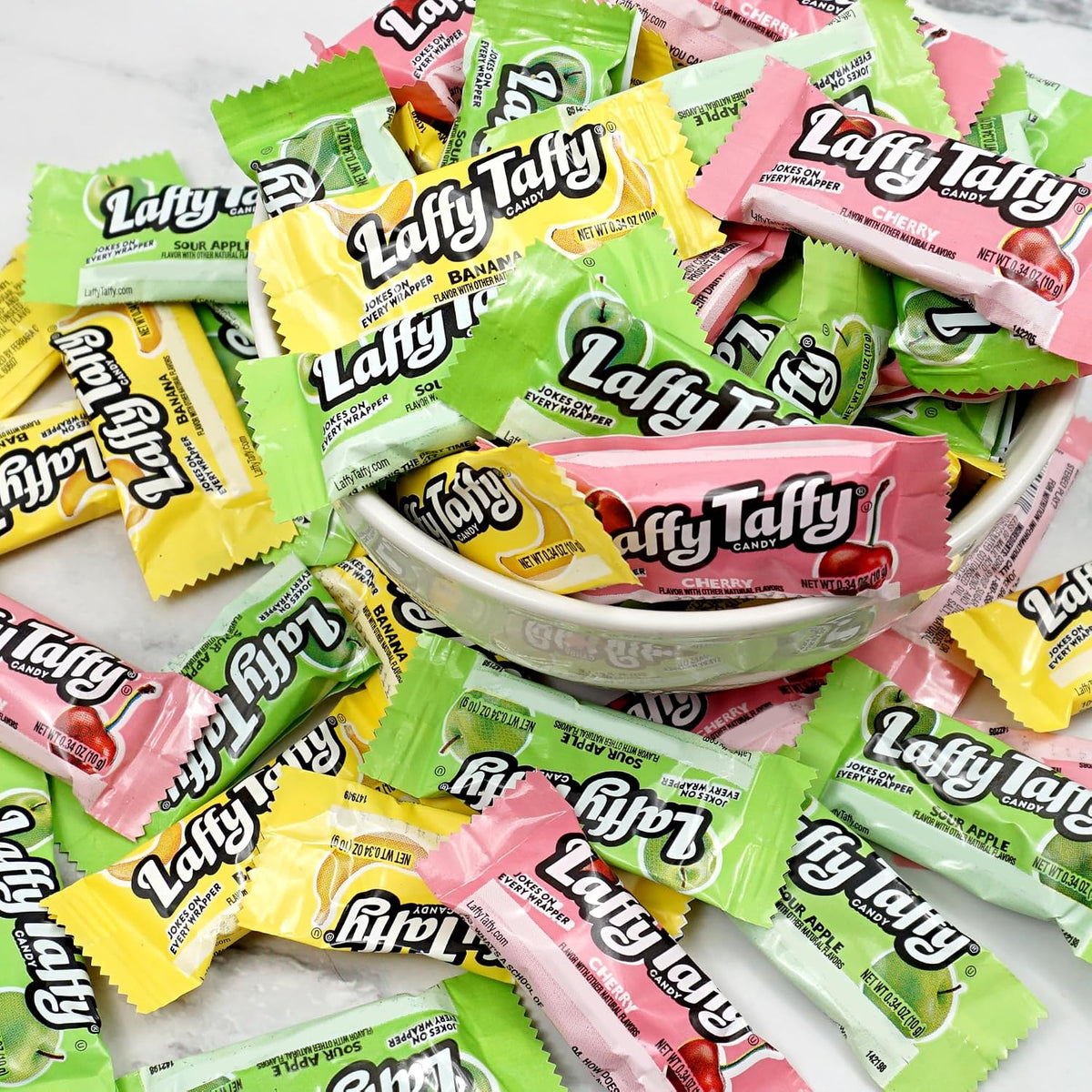 Banana cherry and sour apple chewy candy assortment close up