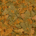Aquarium fish eating natural ingredient flakes
