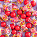Close up of individually wrapped Atomic Fireball cinnamon candy