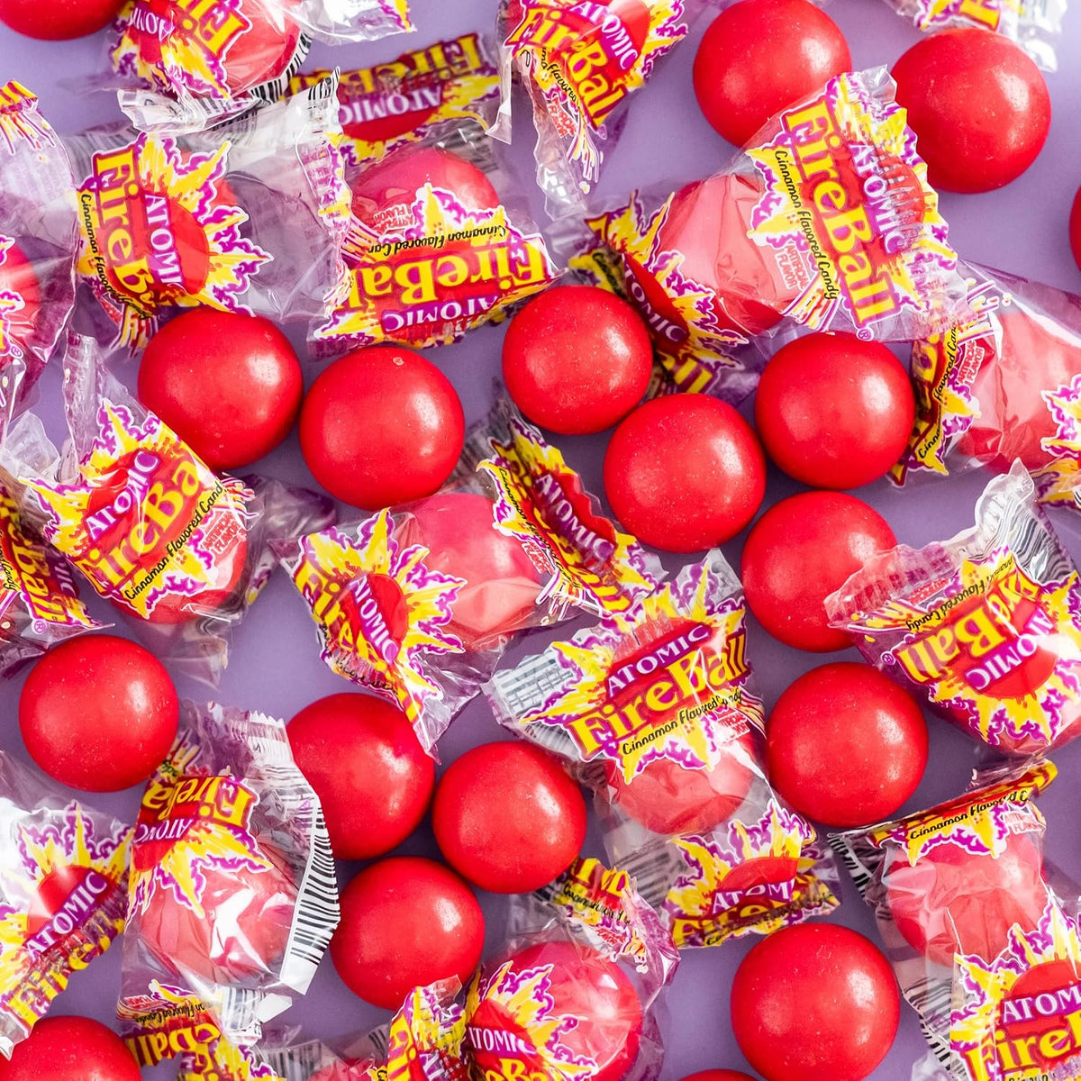 Close up of individually wrapped Atomic Fireball cinnamon candy