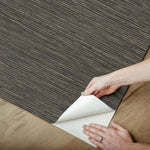 Textured woven design black grasscloth wallpaper sample angle shot
