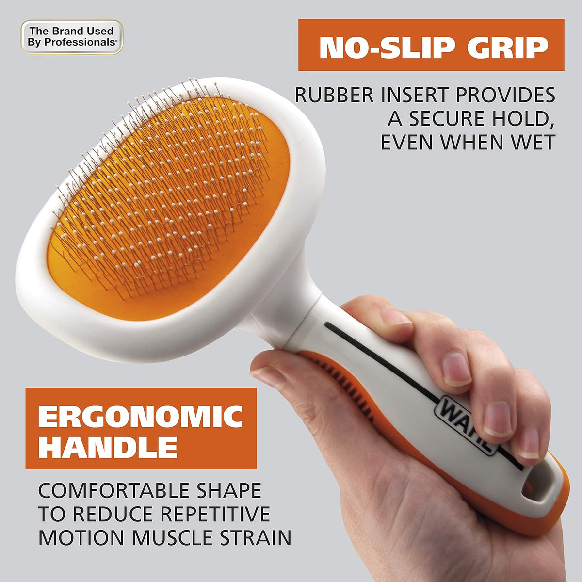 Wahl sensitive skin pet slicker tool being used to groom a long-haired dog.