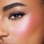 Luxury travel size face makeup duo by Charlotte Tilbury in elegant rose gold packaging.
