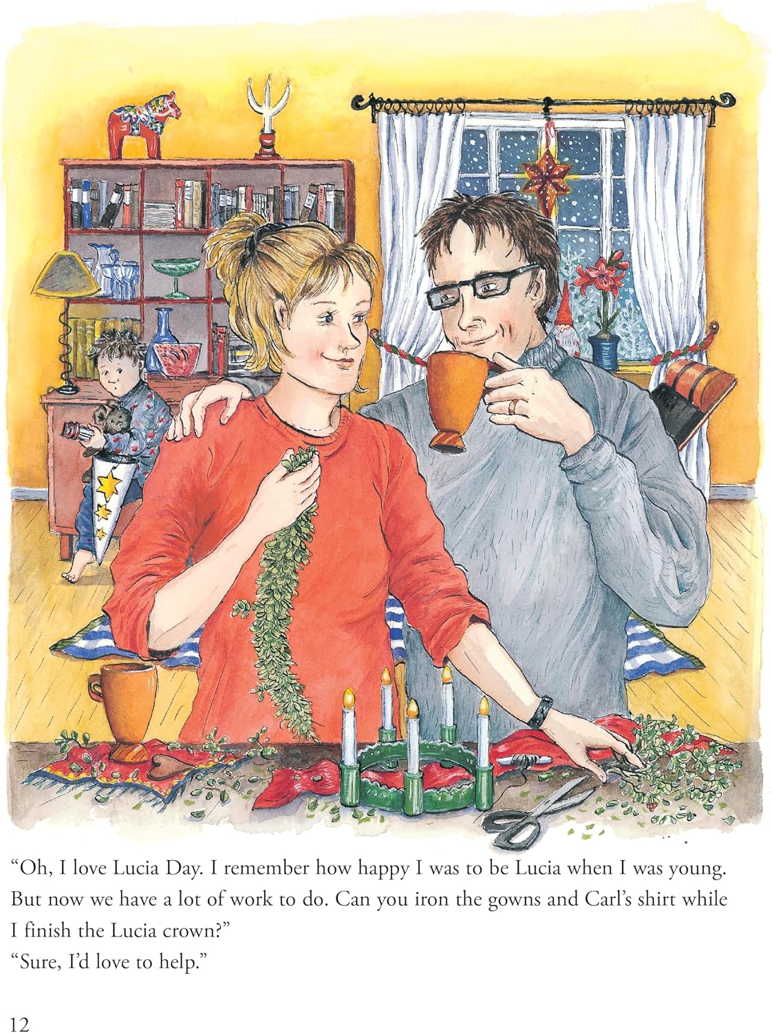 Open book pages displaying festive winter holiday artwork