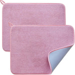 Hlavite dish drying mat front view showcasing the medium pink absorbent microfiber texture on a clean kitchen counter.