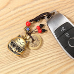 Mansiyuyee maneki neko charm with braided tassel