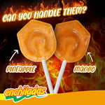 Assorted mango and pineapple spicy Mexican lollipops