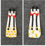 Back view of Magnoloran reusable poultry nappies showing the tail opening and secure attachment straps.