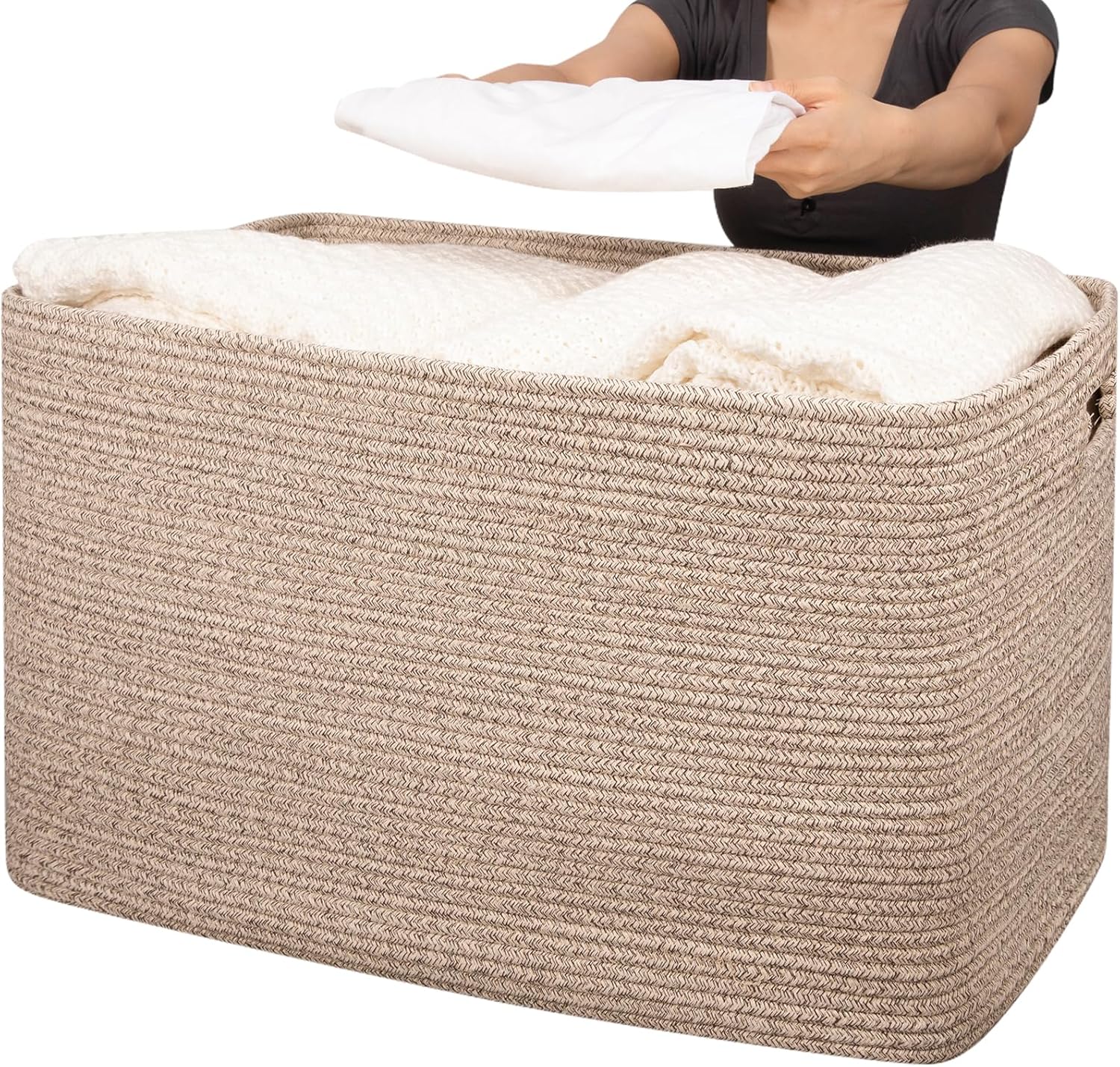 OIAHOMY 118L XXXLarge Cotton Rope Storage Basket front view holding blankets in a modern living room