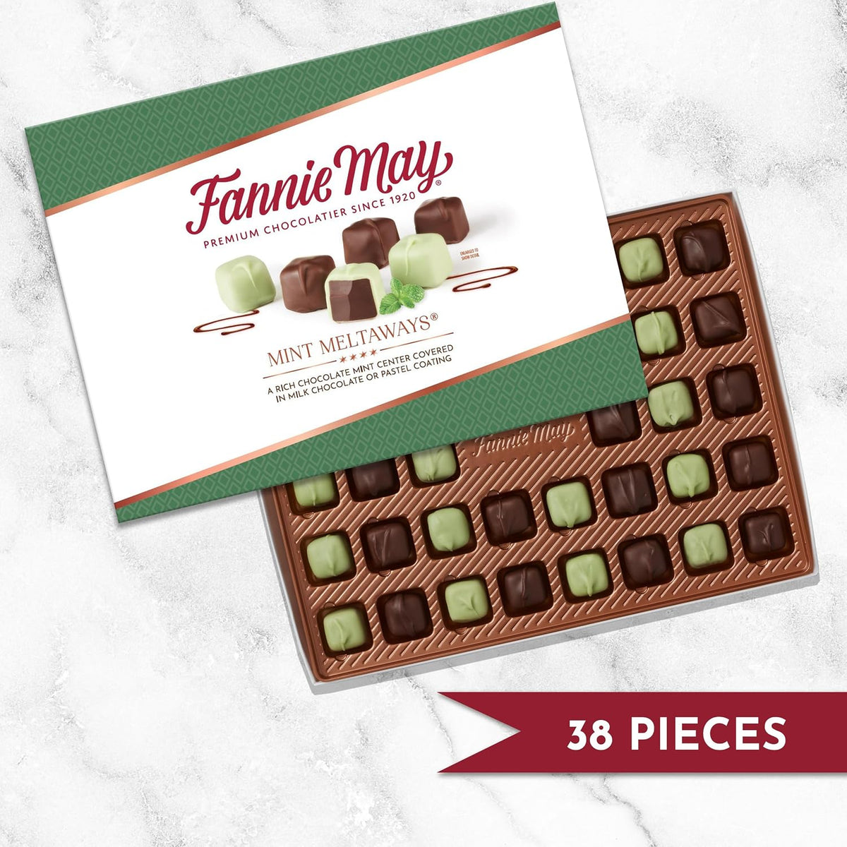 Cross section view highlighting the creamy mint center inside the milk chocolate.