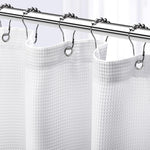 NEATERIZE White Shower Curtain front view hanging in a luxury modern bathroom setup.
