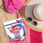 Group of colorful mini fish shaped chewy candies from USA import snack bag