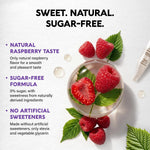 Liquid biotin supplement bottle next to fresh raspberries