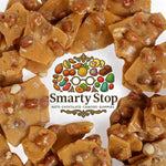 Smarty Stop peanut brittle candy displayed beautifully in a clear glass serving dish for parties