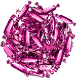 Candy Envy pink caramels styled in a decorative glass candy jar