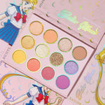 ColourPop Sailor Moon eyeshadow palette open showing 12 shades