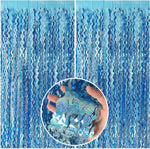 BOMSI wavy tinsel foil fringe curtains front view showing light blue metallic sparkle backdrop