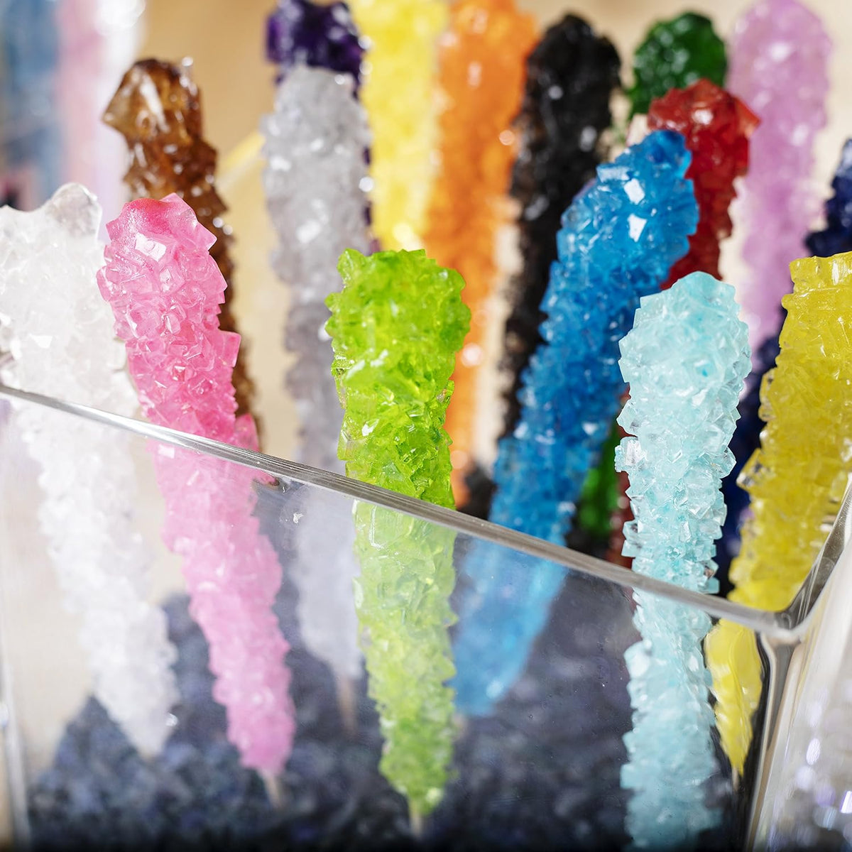 Assorted flavor American rock candy sticks used as drink stirrers.