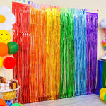 LOLStar rainbow party decorations two pack foil fringe curtains front view hanging on a party wall