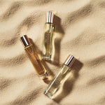 Estée Lauder luxury fragrance bottle next to its original product box.