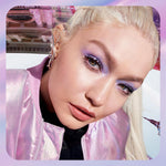 Applying Maybelline Falsies Surreal mascara to eyelashes