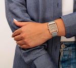 Nine West taupe sunray dial watch close up with rose gold markers