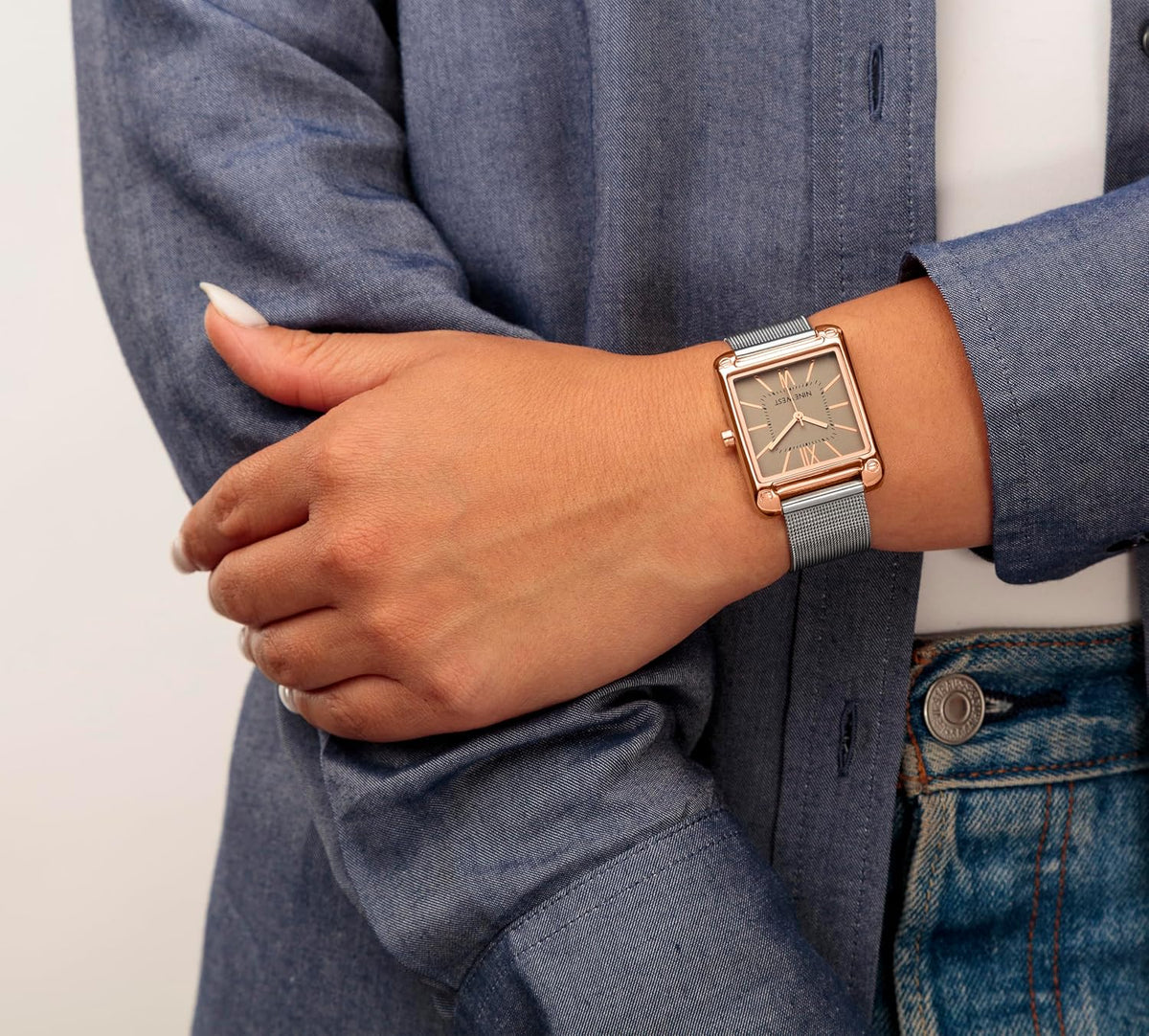 Nine West taupe sunray dial watch close up with rose gold markers