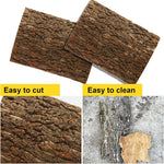 Flexible cork habitat decoration panel being trimmed with scissors for size