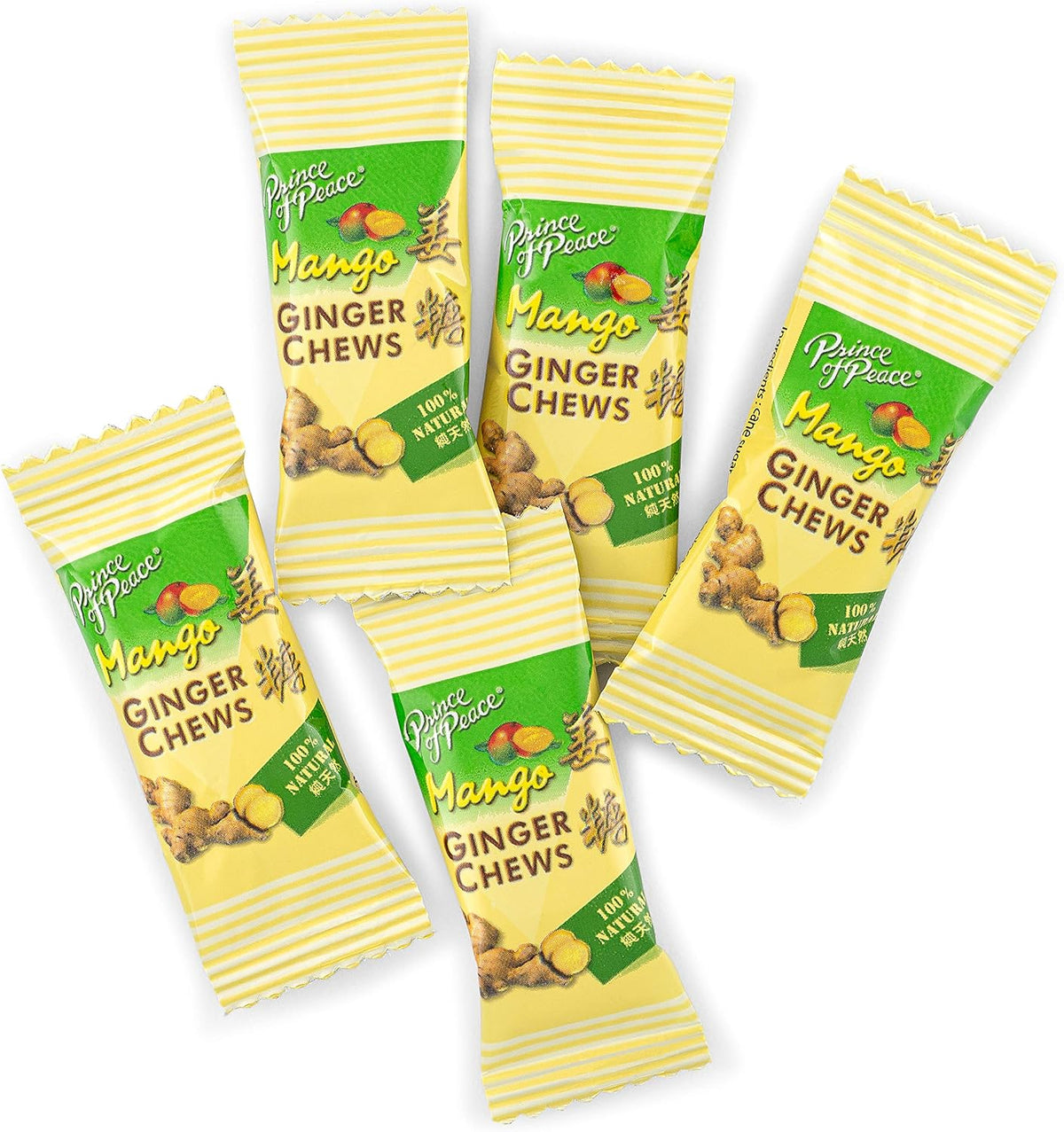 Individually wrapped mango flavored ginger candy pieces scattered outside the family size packaging.