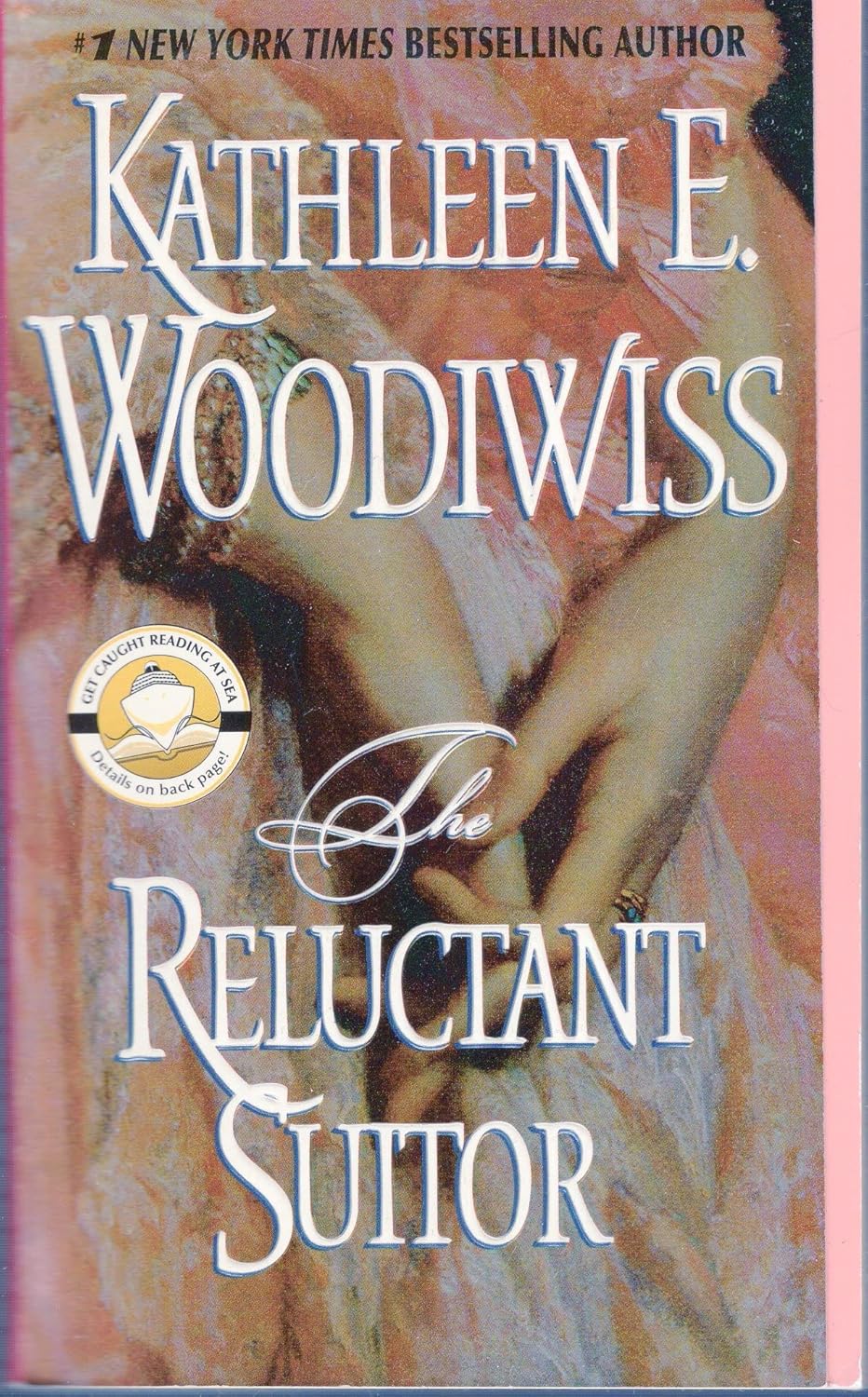 Kathleen E Woodiwiss The Reluctant Suitor paperback novel front view showing historical cover painting