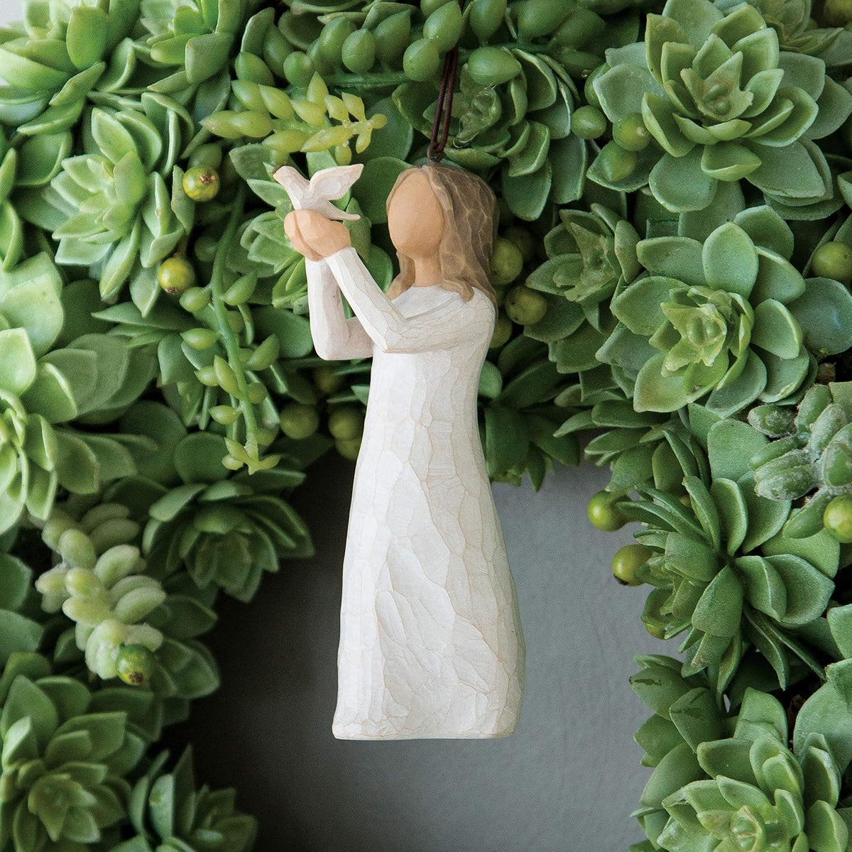 Willow Tree Soar ornament showing white dove and extended arms