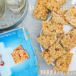 NY Spice Shop holiday gift box option showing multiple crunchy snack bars inside