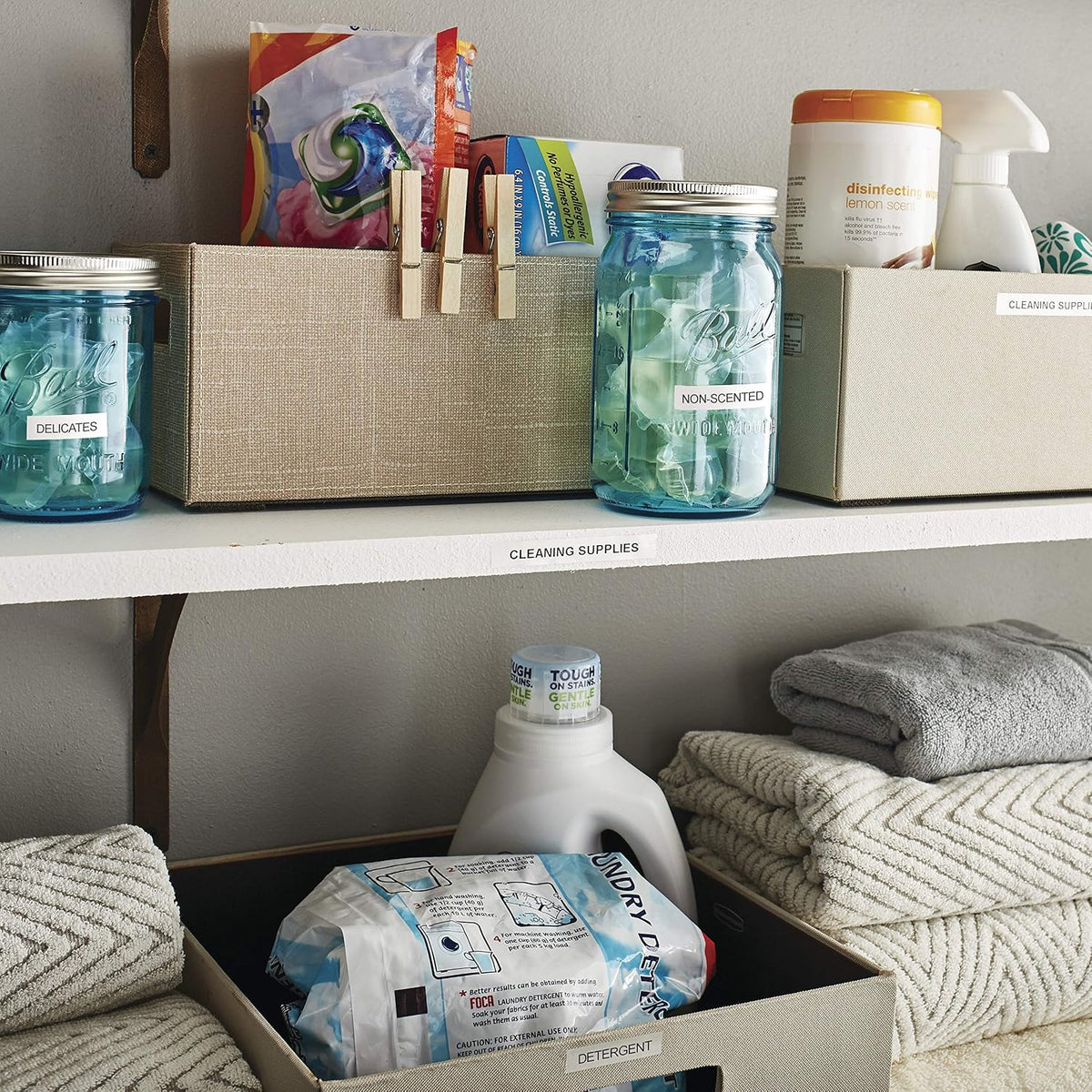 Organized household containers labeled with DYMO paper tape