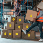 Parlaim office organization stickers displayed on cardboard boxes