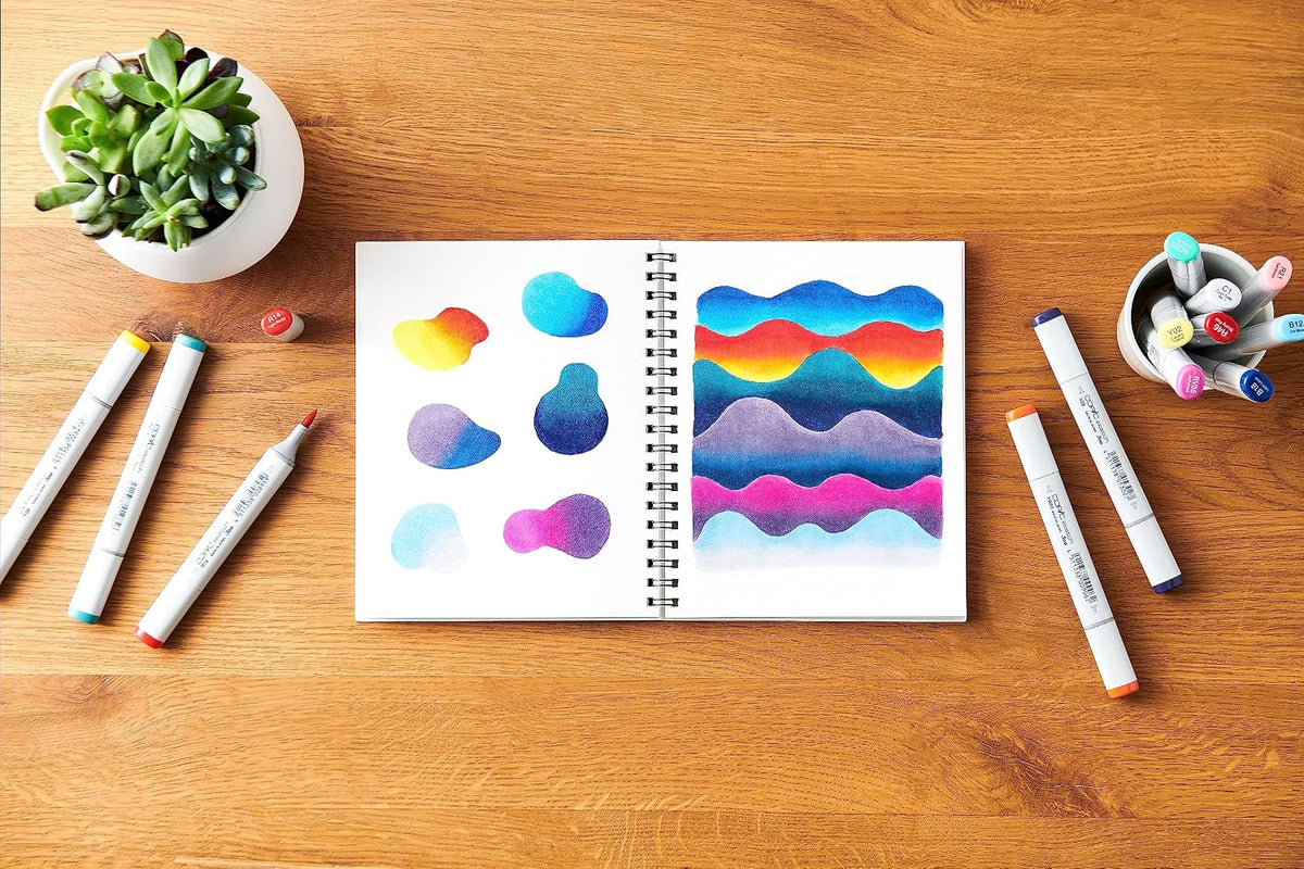 Angle view of Copic marker sketchbook showing portable dimensions