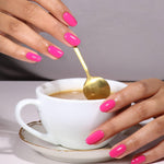 At home salon quality manicure process using UV LED curing lamp with gel top coat