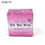Demonstration of cutting the custom length of self stick silk wrap for gel extension setup.