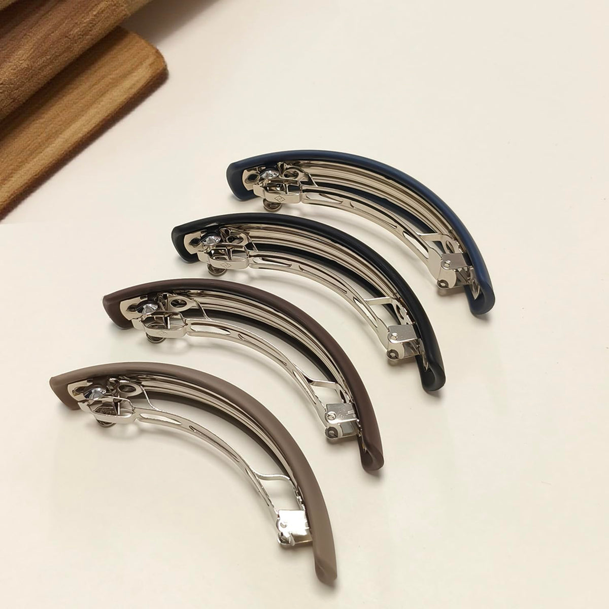 Premium imported hair barrettes packaging layout showing all four pieces.