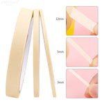 Close up of adhesive nail art design strips
