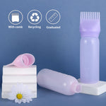 Translucent purple hair dye applicator bottle with clear measurement scale details.