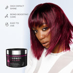 Model showing vibrant burgundy hair result after using XMONDO