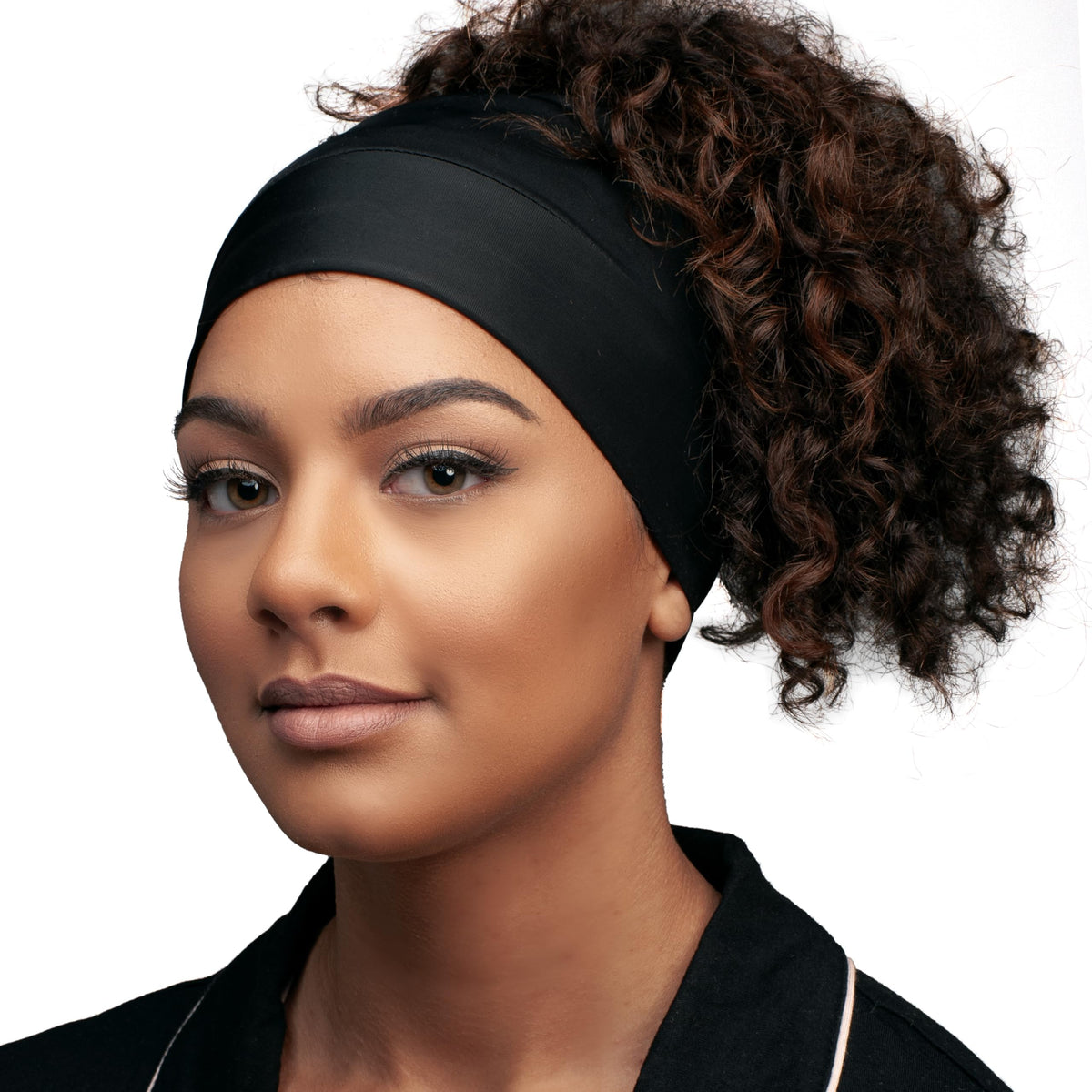 Evolve hair cap displayed on packaging for curly hair care