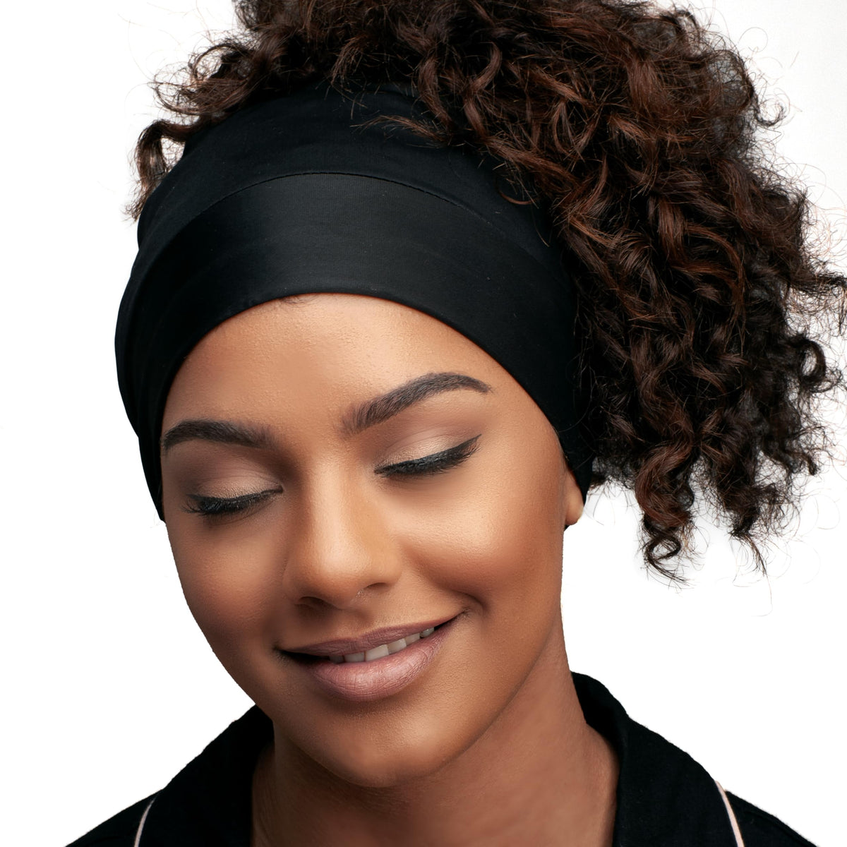 Back view of Evolve satin sleep cap showcasing secure elastic band
