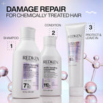 USA imported Redken bonding care complex shampoo container on a plain background