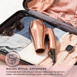 Lura compact hair dryer showing foldable handle mechanism